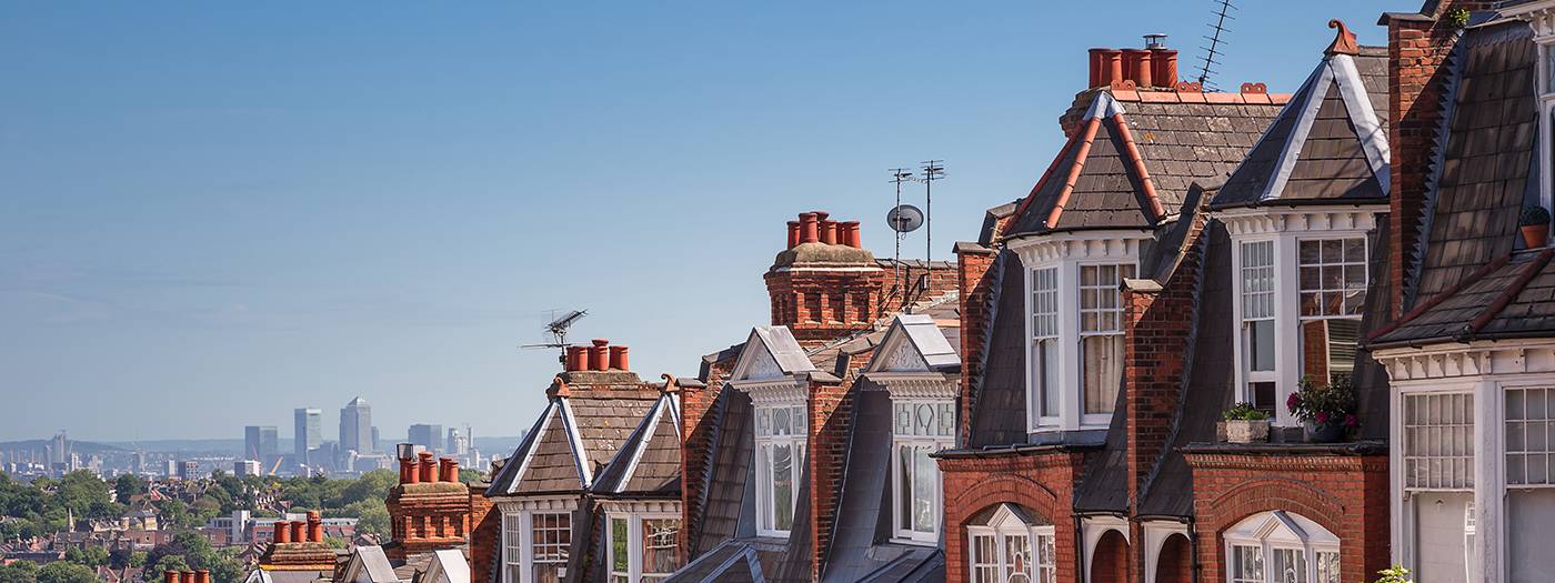 A row of rooftops on a typical British street