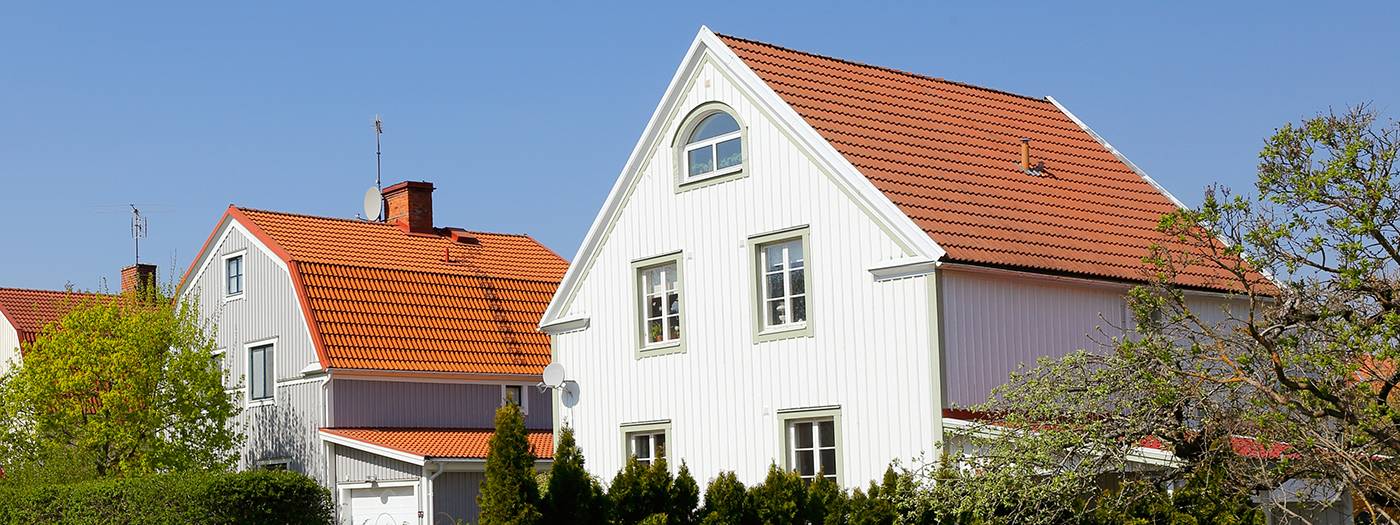 White houses with orange roofs